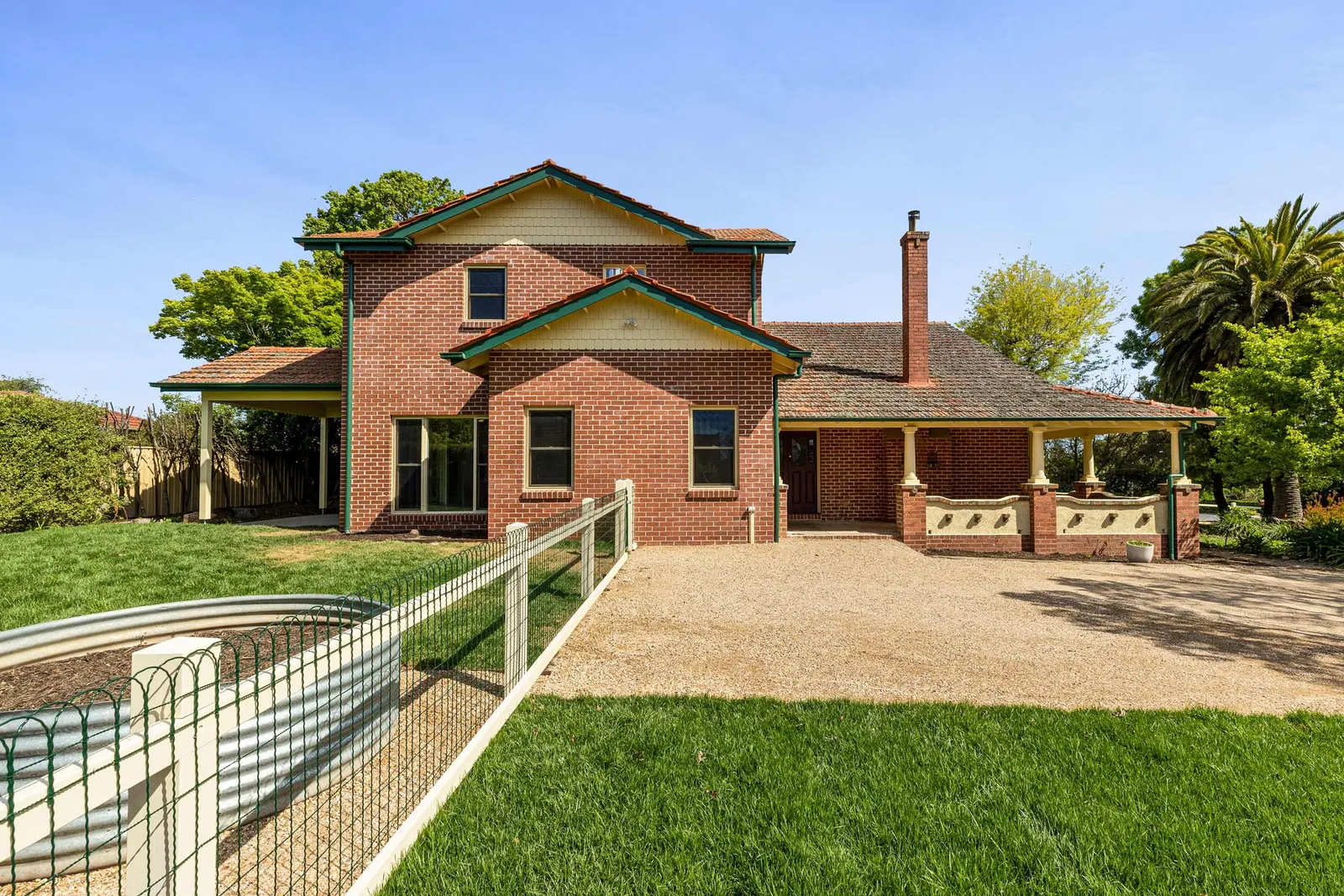 Rear elevation of the Barton St home in Kyneton, brick with a return verandah